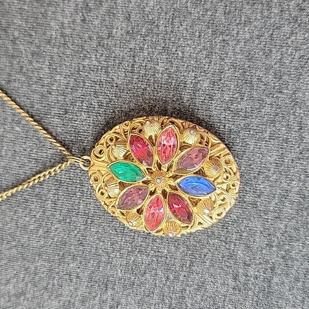 Vintage Multi Rhinestone Open Work Gold Tone Oval Locket Necklace